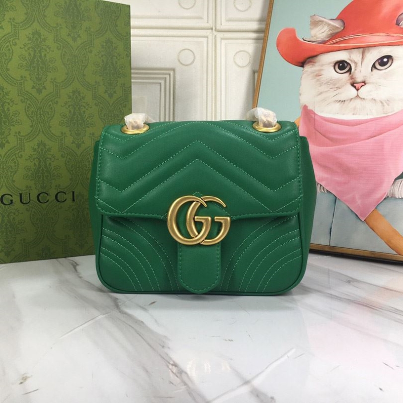G*u*i clutch bags
